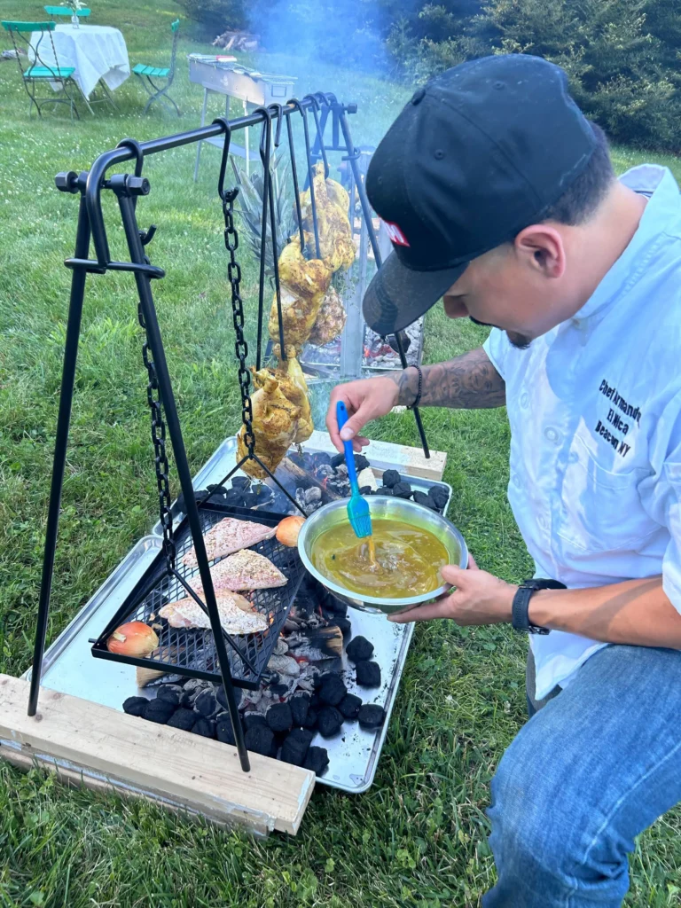 Chef Armando plating a dish